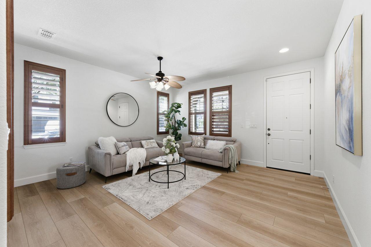 698 West Rico Way Tracy, CA 95391 - Photo 7 of 48 a living room with furniture