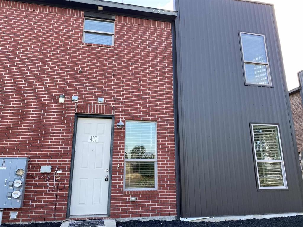 a brick house with a door