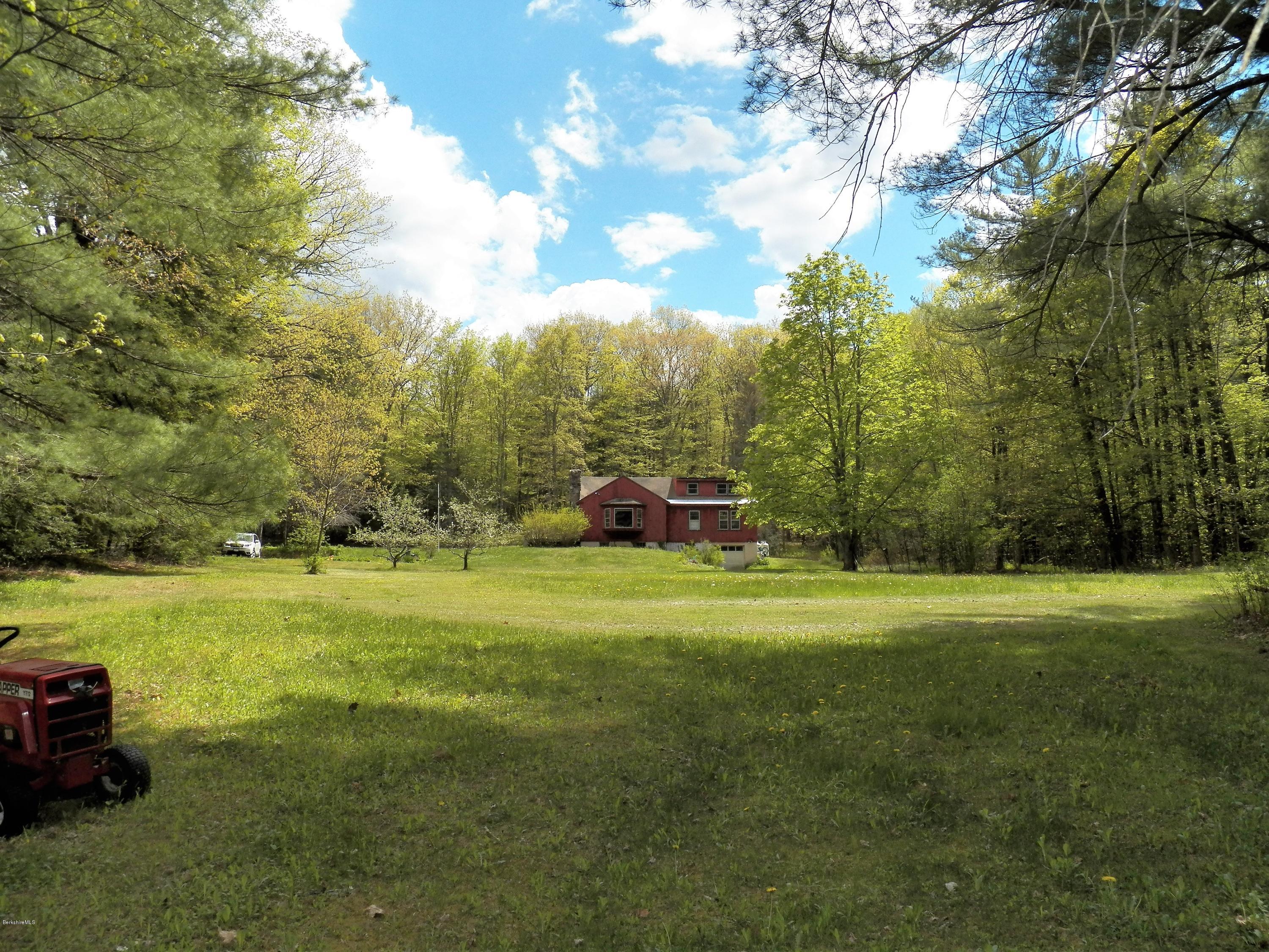 54 Sandisfield Road Monterey, MA 01245 - Photo 8 of 13 a fire hydrant in the middle of a field