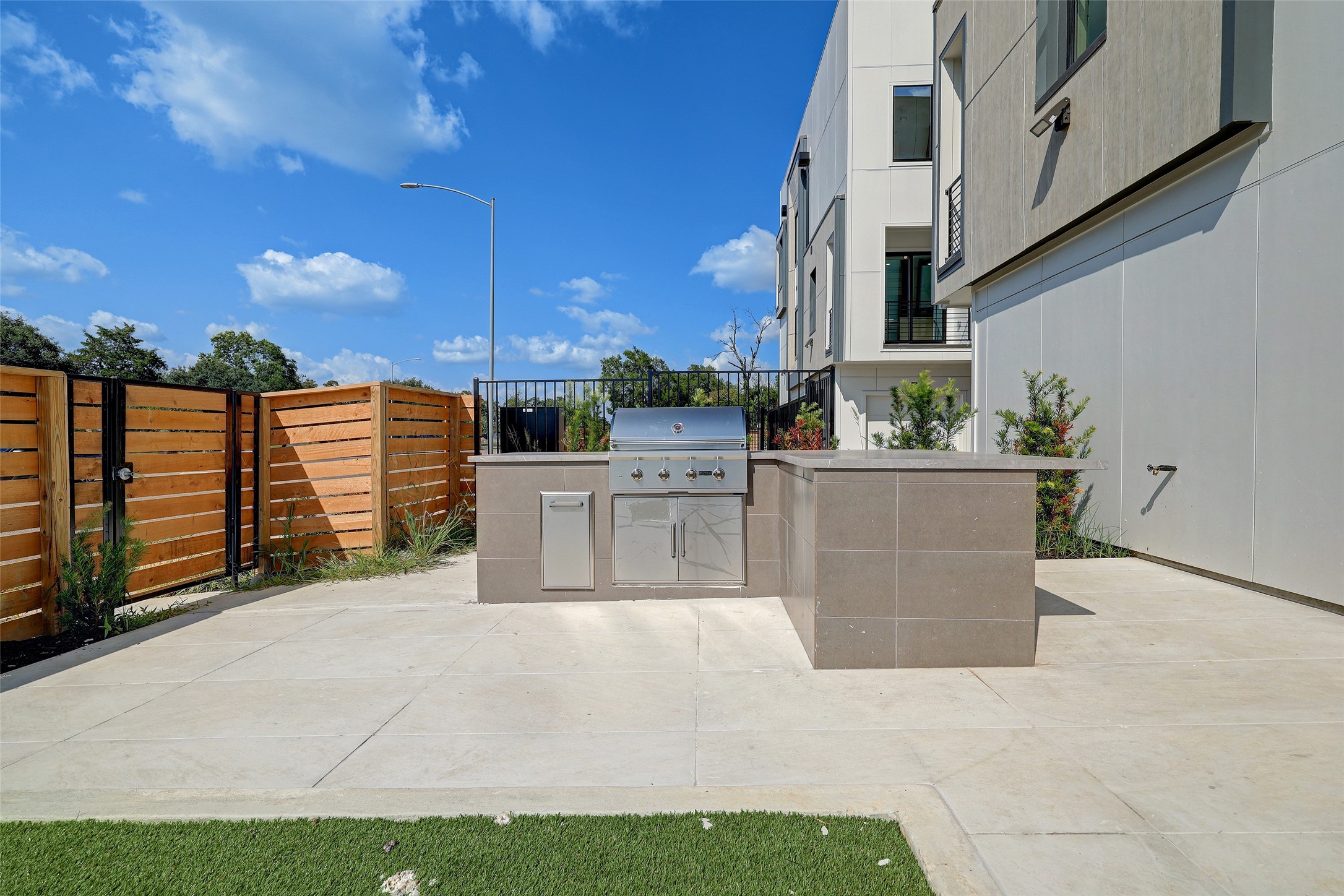 4932 Old Spanish Trail, Unit D301 Houston, TX 77021 - Photo 27 of 29 a view of a terrace with outdoor seating
