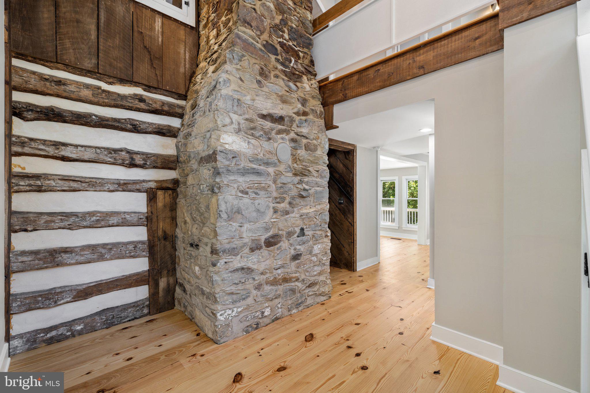 37028 Gaver Mill Road Purcellville, VA 20132 - Photo 13 of 79 Foyer with Beautiful Stone Fireplace Chimney