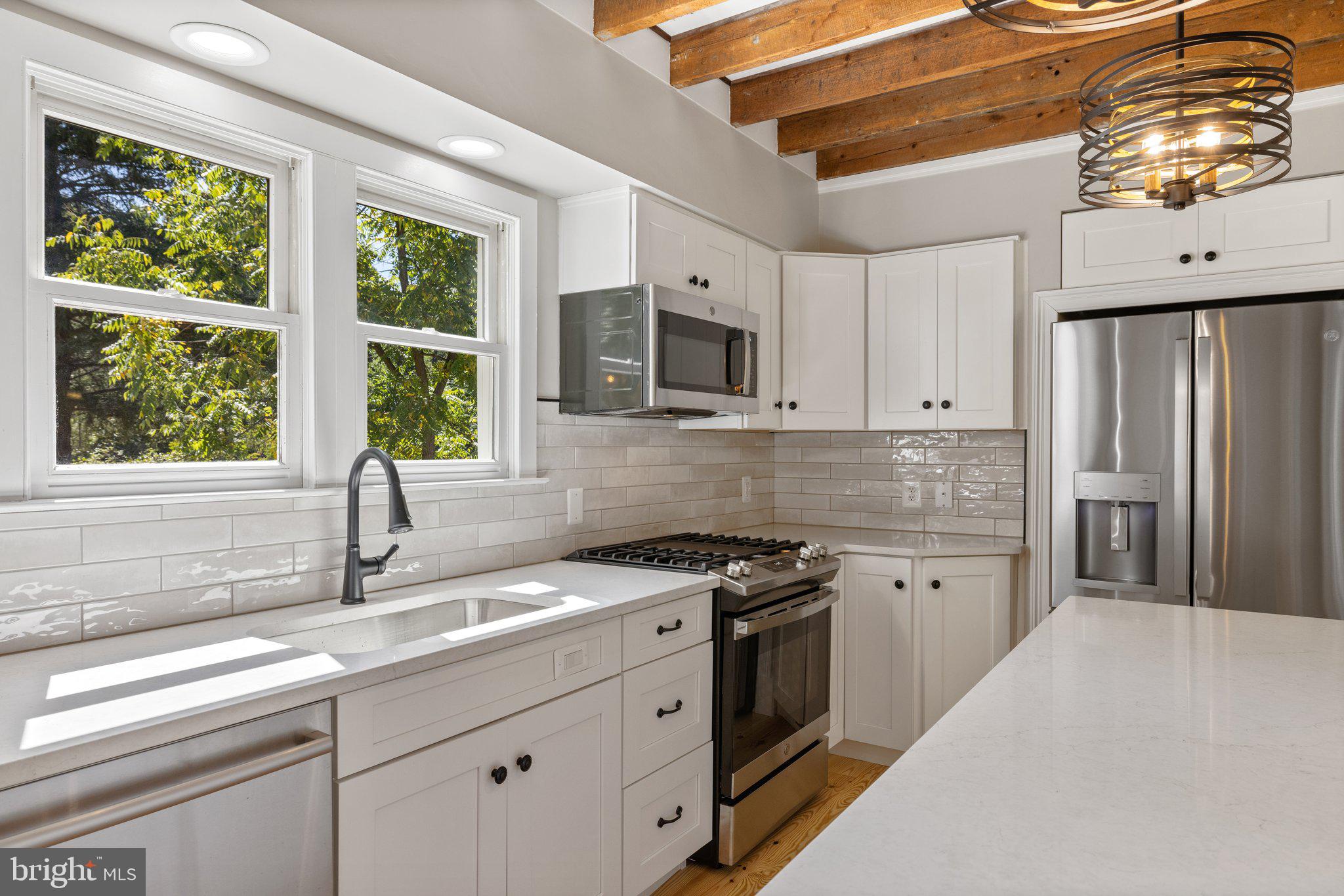 37028 Gaver Mill Road Purcellville, VA 20132 - Photo 36 of 79 Renovated Kitchen with Propane Gas Cooking