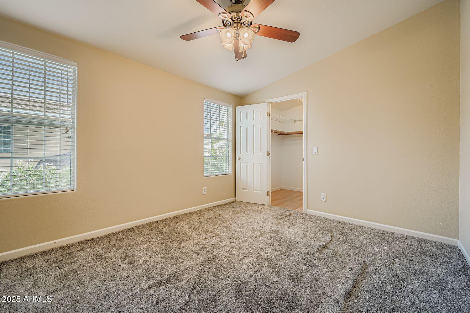 2550 South Ellsworth Road, Unit 277 Mesa, AZ 85209 - Photo 16 of 21 a view of an empty room with a window