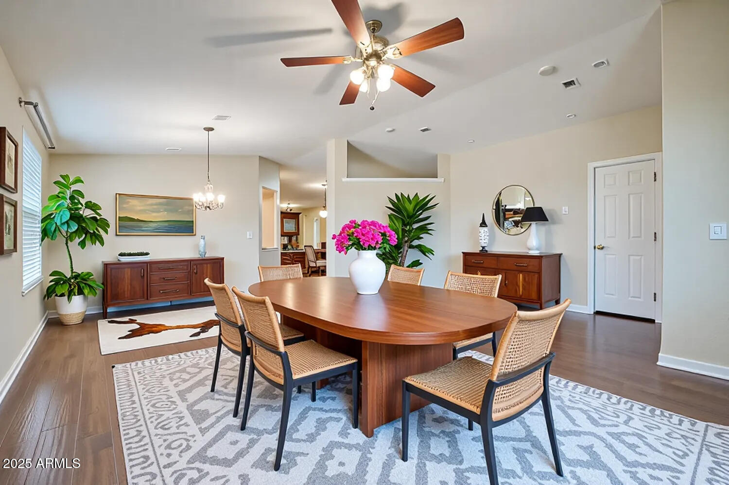 2550 South Ellsworth Road, Unit 277 Mesa, AZ 85209 - Photo 6 of 21 a view of a dining room with furniture and a potted plant