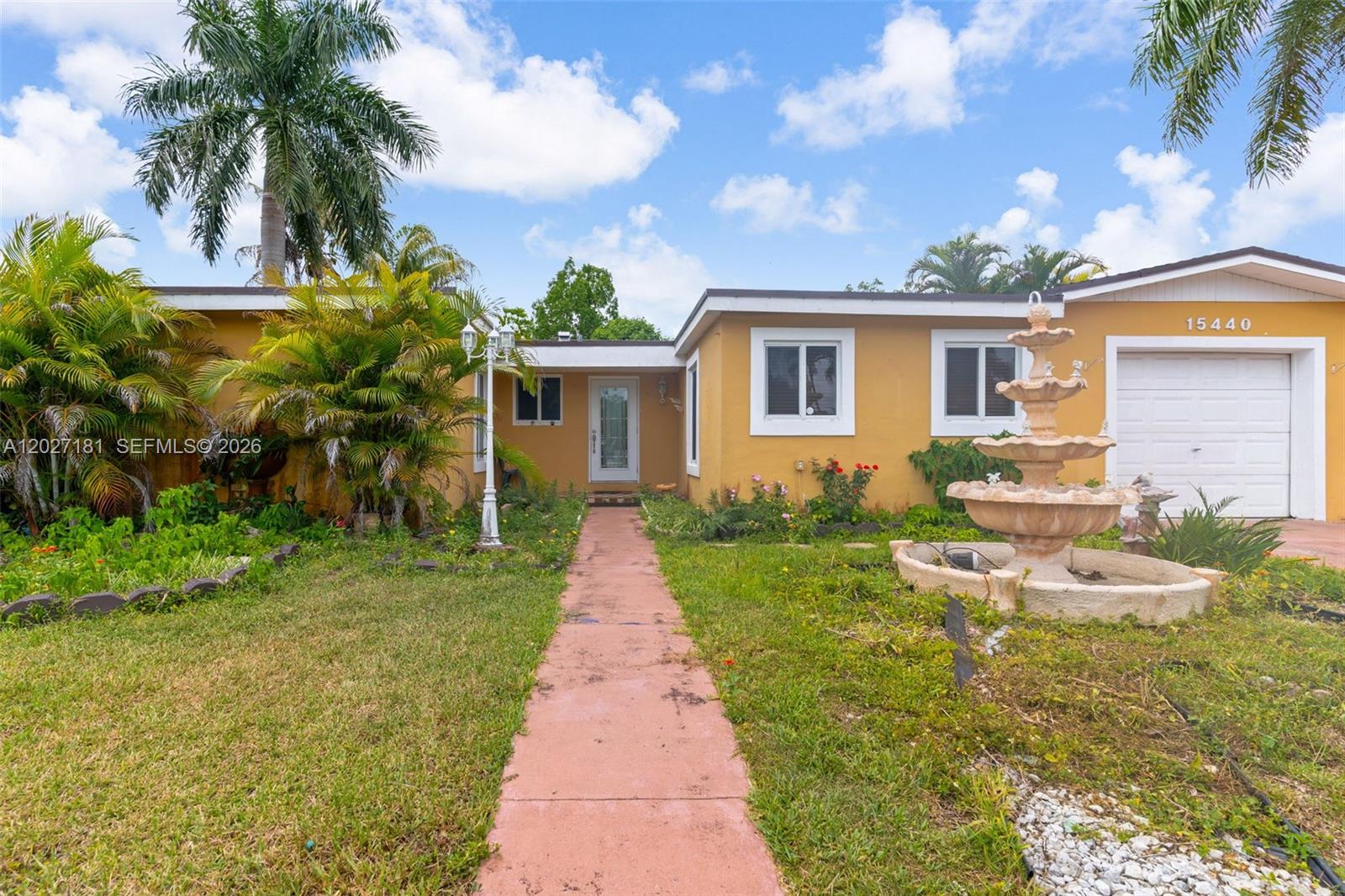 15440 Southwest 294th Terrace Homestead, FL 33033 - Photo 27 of 31 a front view of house with yard and green space