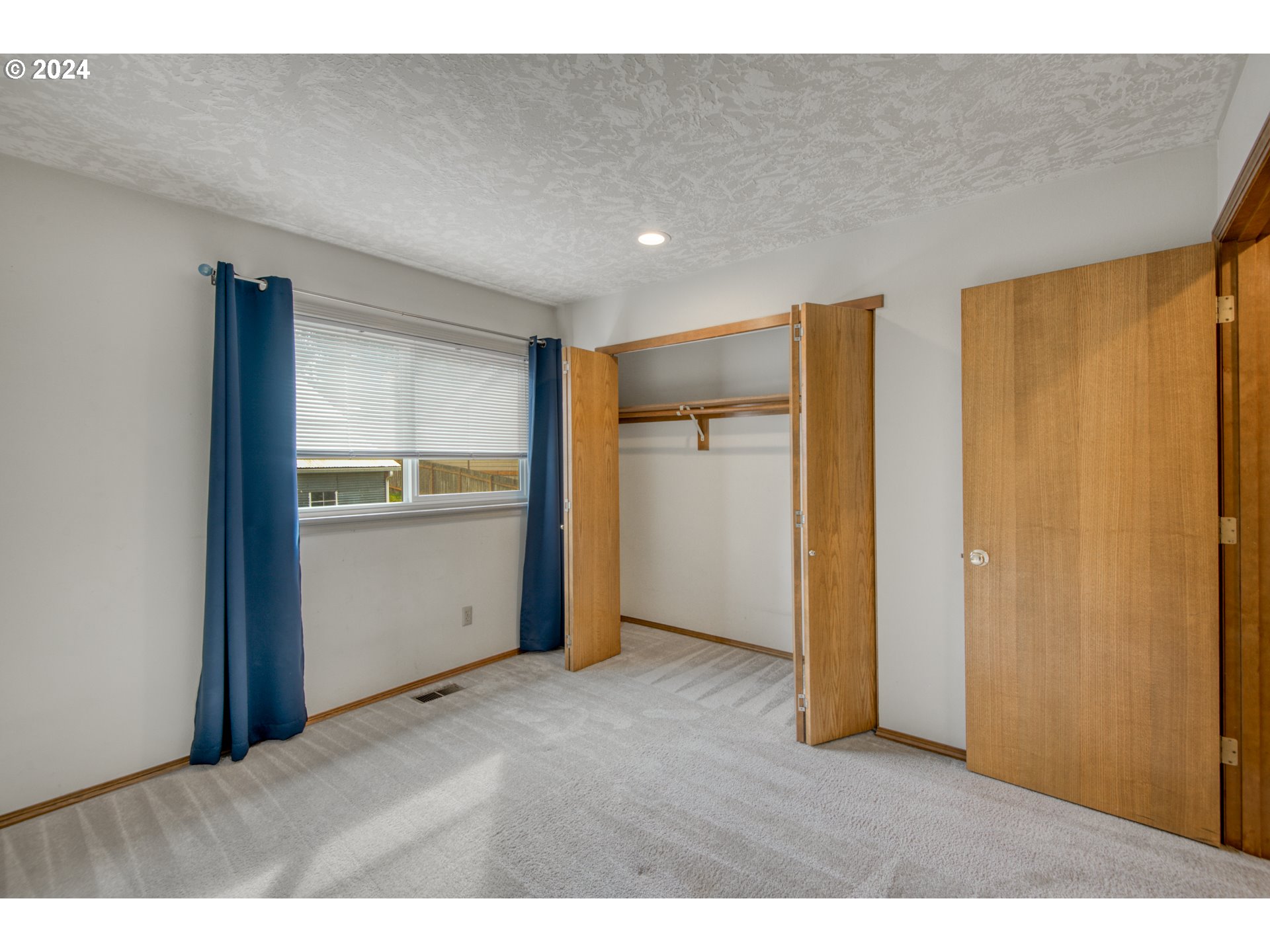 612 Southeast Lovrien Place Gresham, OR 97080 - Photo 24 of 48 a view of empty room with wooden floor
