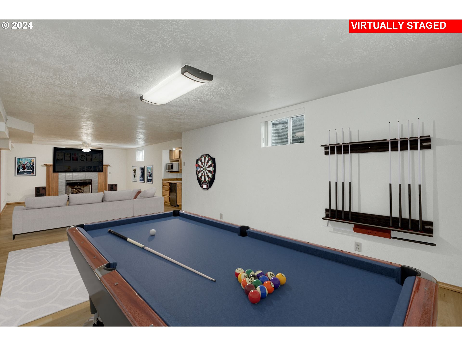 612 Southeast Lovrien Place Gresham, OR 97080 - Photo 28 of 48 a living room with furniture pool table and a flat screen tv