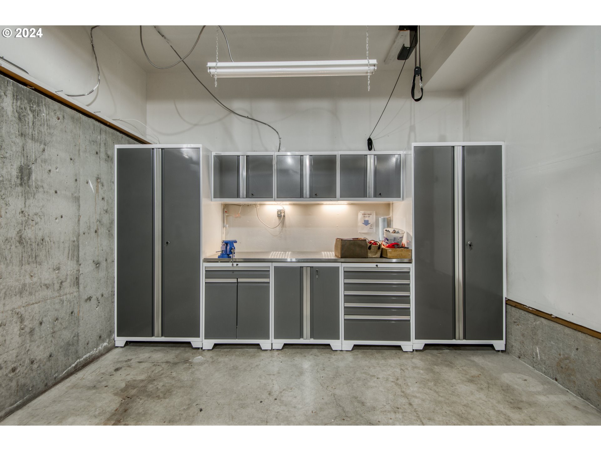 612 Southeast Lovrien Place Gresham, OR 97080 - Photo 33 of 48 a kitchen with kitchen island a stove and a refrigerator