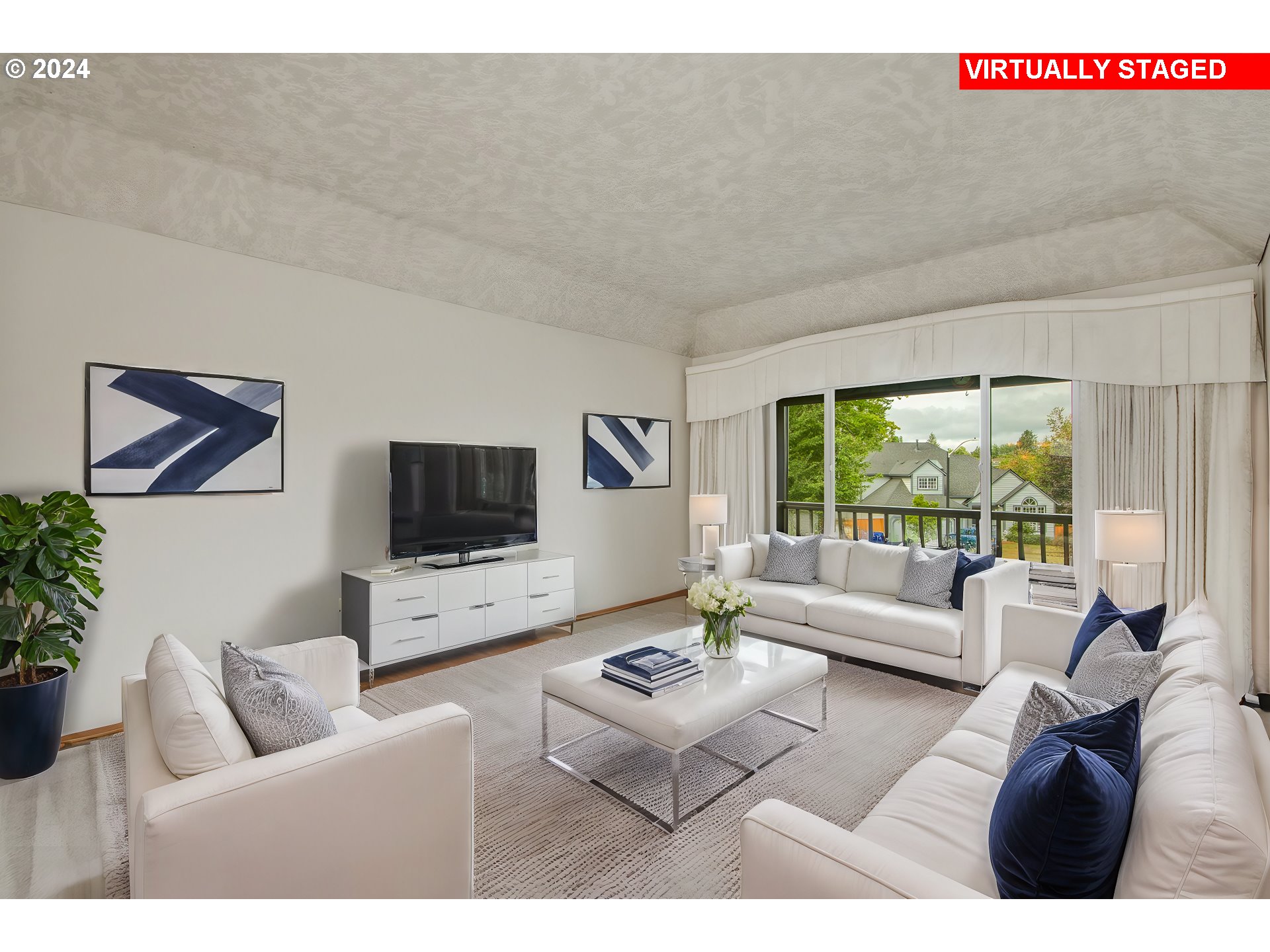 612 Southeast Lovrien Place Gresham, OR 97080 - Photo 4 of 48 a living room with furniture and a flat screen tv