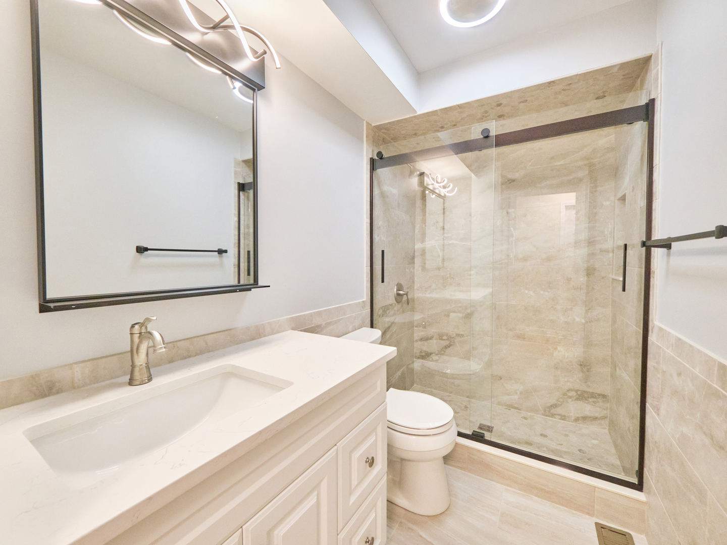 18207 Ravisloe Terrace Country Club Hills, IL 60478 - Photo 11 of 24 a bathroom with a sink and a mirror