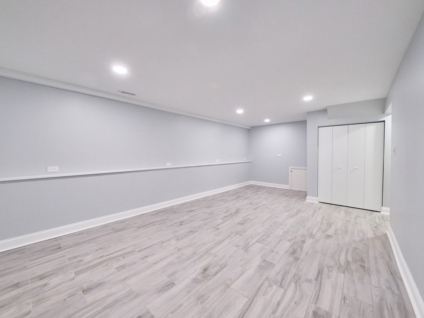 18207 Ravisloe Terrace Country Club Hills, IL 60478 - Photo 16 of 24 a view of an empty room with wooden floor