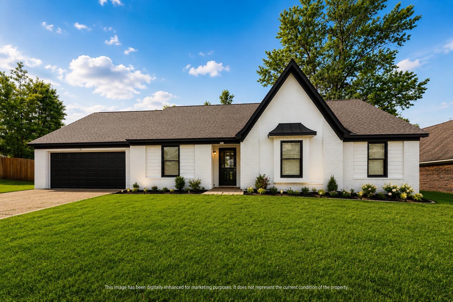 7421 Richmond Road Memphis, TN 38125 - Photo 1 of 39 Modern farmhouse-style exterior featuring white brick siding, a dark asphalt shingle roof, black framed windows, a black garage door, and a concrete driveway