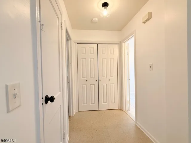 a bathroom with a bathtub a sink and a mirror