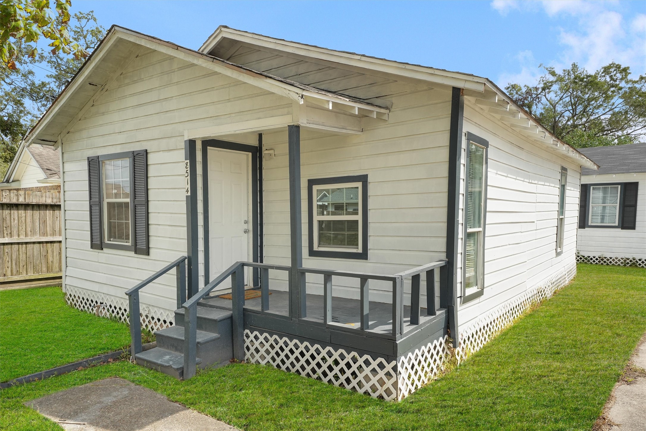 8514 Spaulding Street Houston, TX 77016 - Photo 2 of 19 a view of a house with a yard