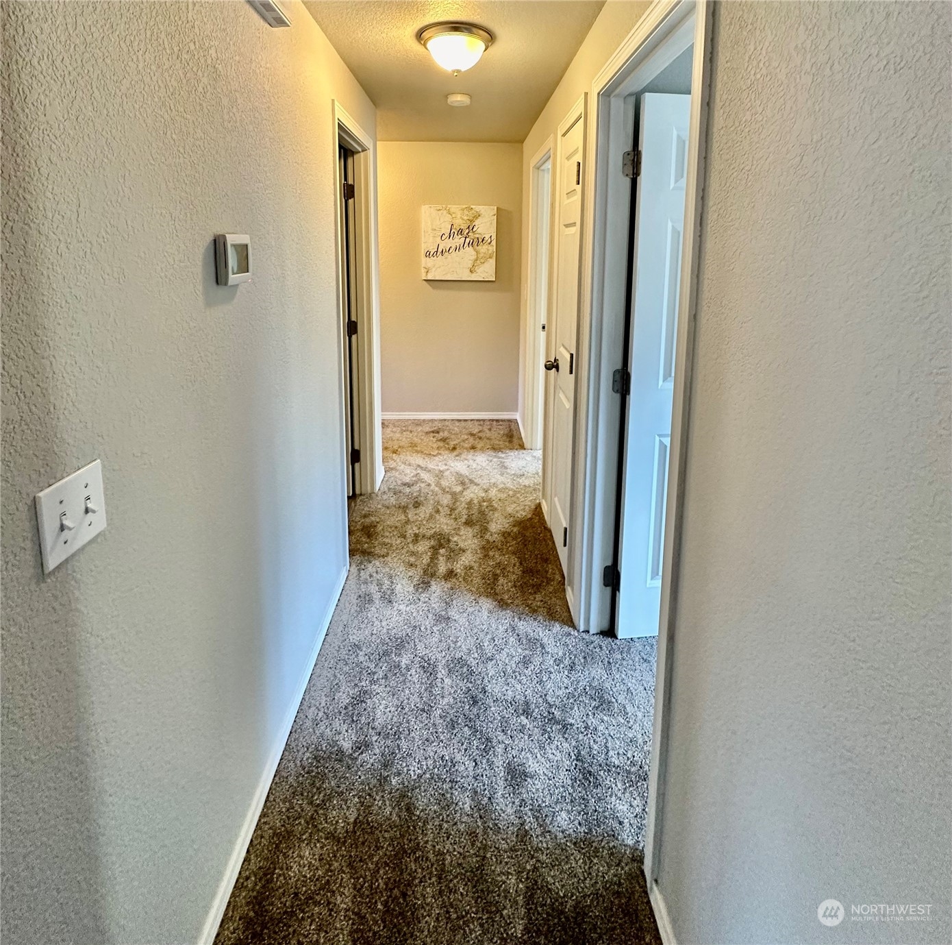 5127-5129 187th Trail Southwest Rochester, WA 98579 - Photo 18 of 40 a view of a hallway