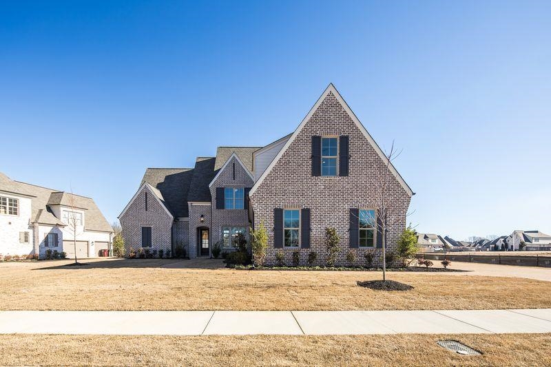 606 Cedar Shadows Circle West Collierville, TN 38017 - Photo 4 of 35 a front view of a house with a yard
