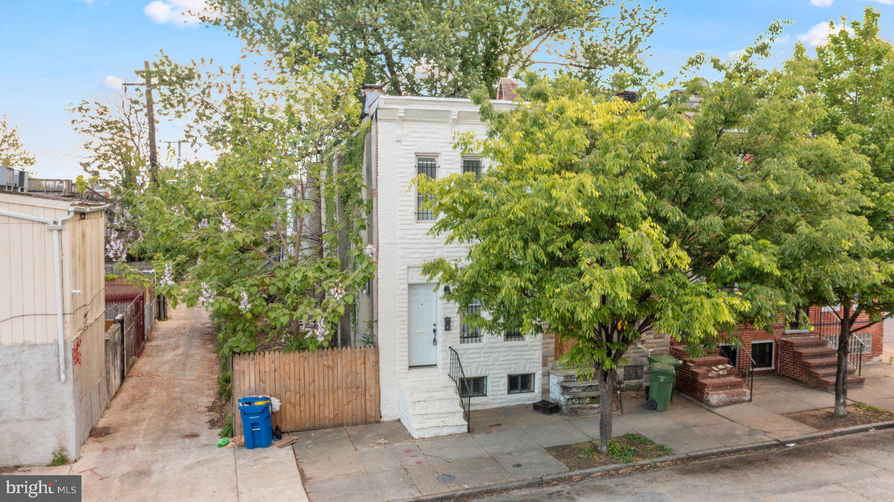 1301 West Cross Street Baltimore, MD 21223 - Photo 2 of 7 a pathway of a house with sitting area