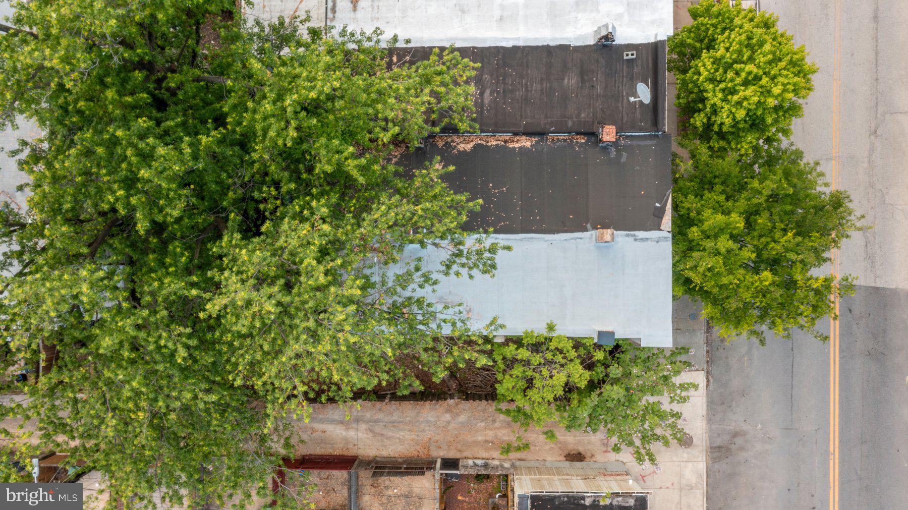 1301 West Cross Street Baltimore, MD 21223 - Photo 3 of 7 an aerial view of a house with a yard