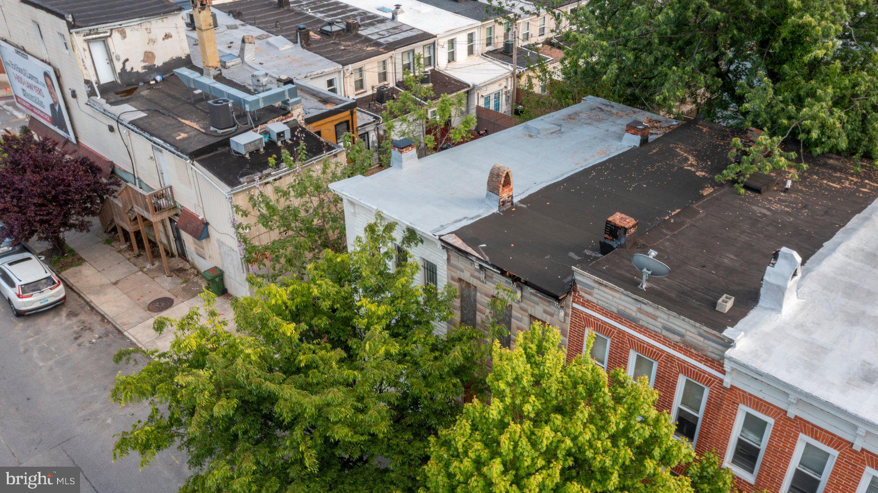 1301 West Cross Street Baltimore, MD 21223 - Photo 7 of 7 an aerial view of residential houses with outdoor space
