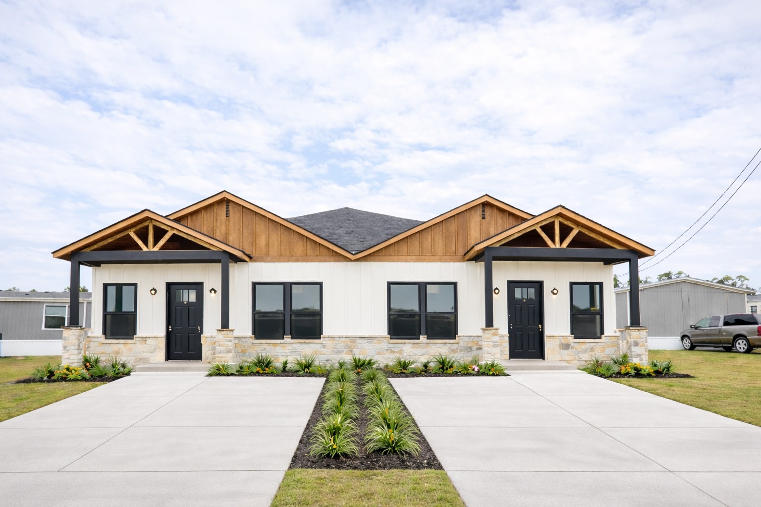 a front view of a house with yard
