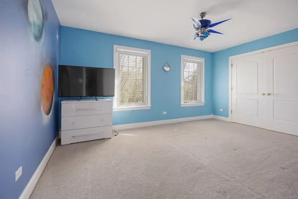 a view of empty room with a flat screen tv