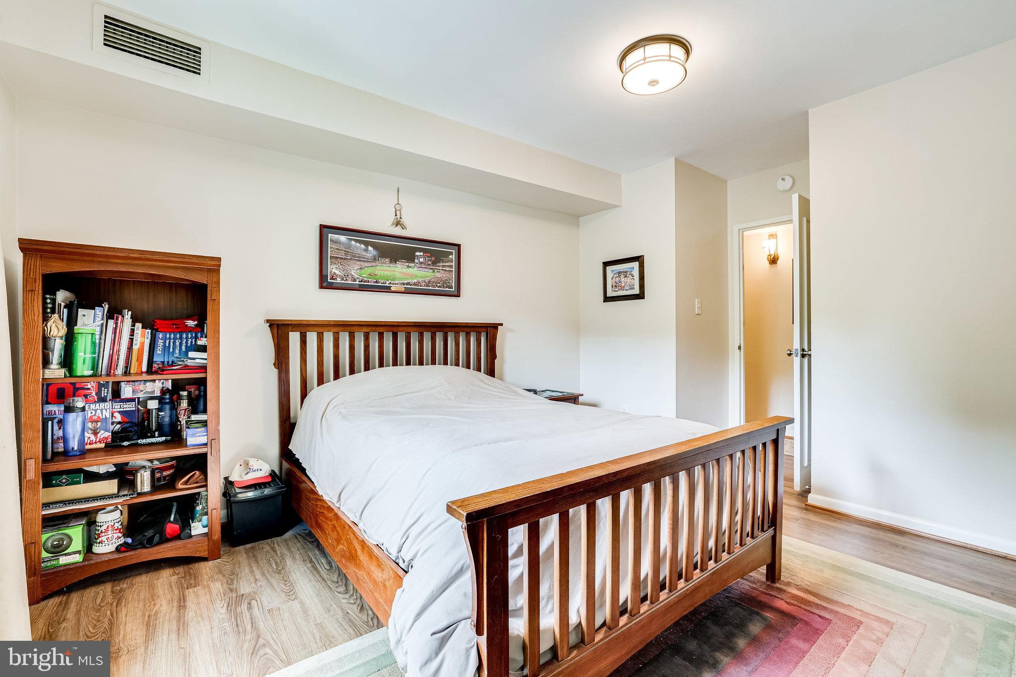 11621 Stoneview Square, Unit 22C Reston, VA 20191 - Photo 21 of 37 Primary Bedroom with Primary Ensuite