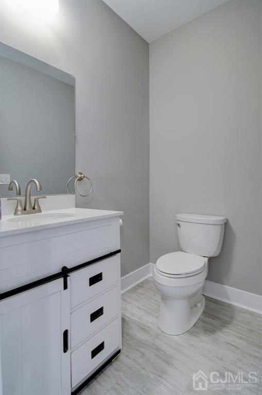 127 North Hill Road Colonia, NJ 07067 - Photo 32 of 40 a bathroom with a sink and a toilet