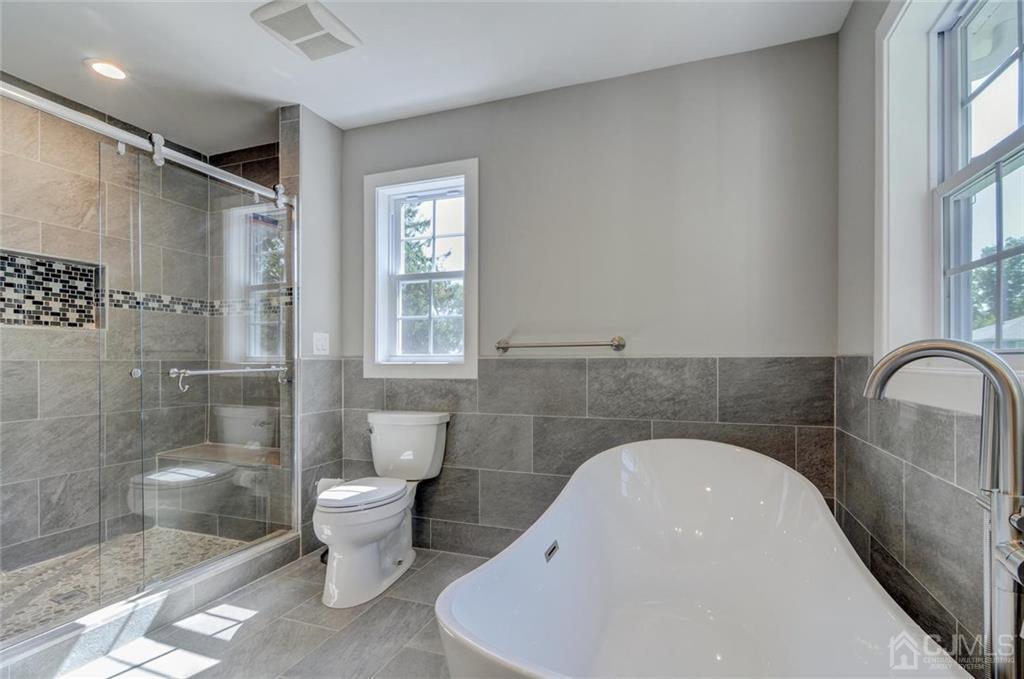 127 North Hill Road Colonia, NJ 07067 - Photo 34 of 40 a bathroom with a sink toilet and shower