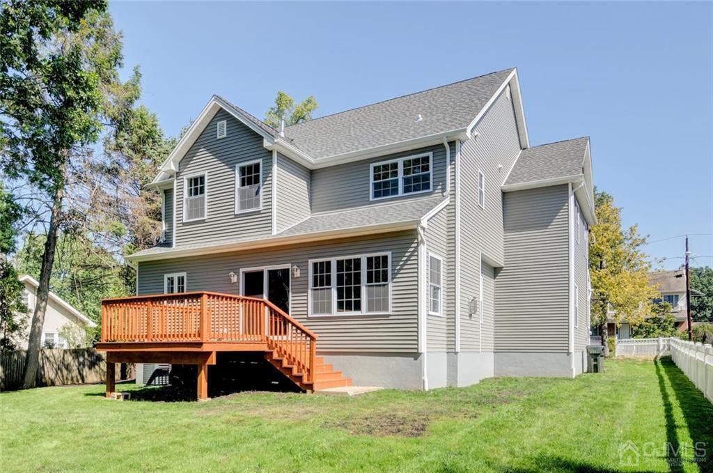 127 North Hill Road Colonia, NJ 07067 - Photo 39 of 40 a front view of a house with a yard