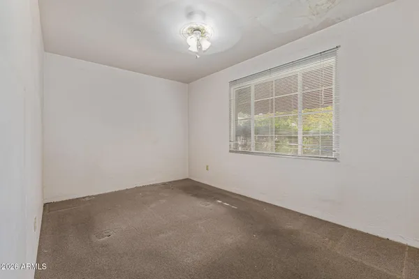 an empty room with a window