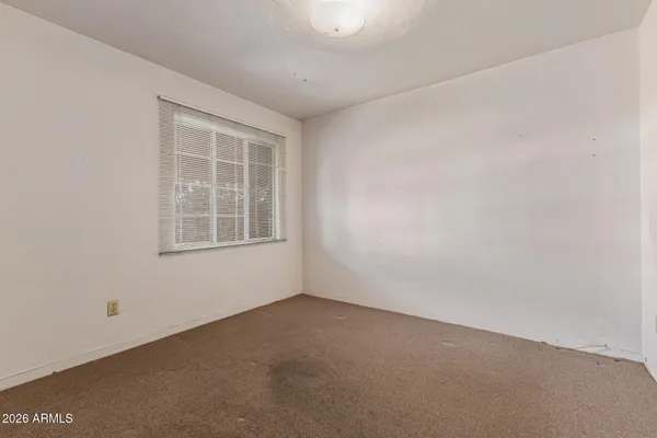 an empty room with a window