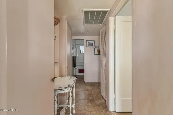 view of hall way with mirror