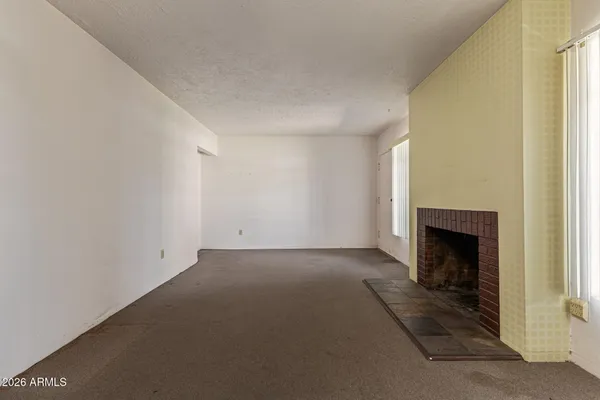 a view of a livingroom with a fireplace