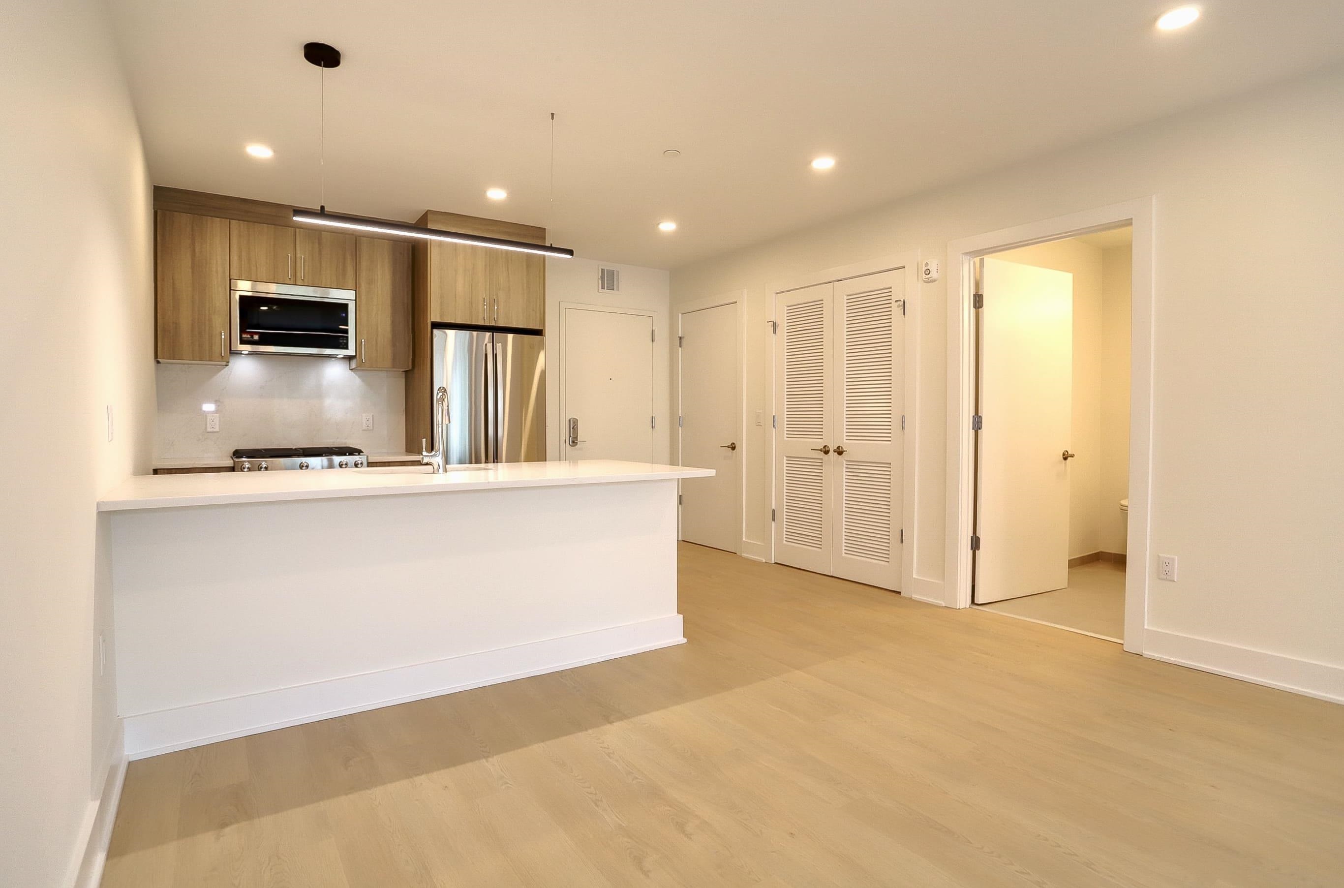 a view of a kitchen with a sink