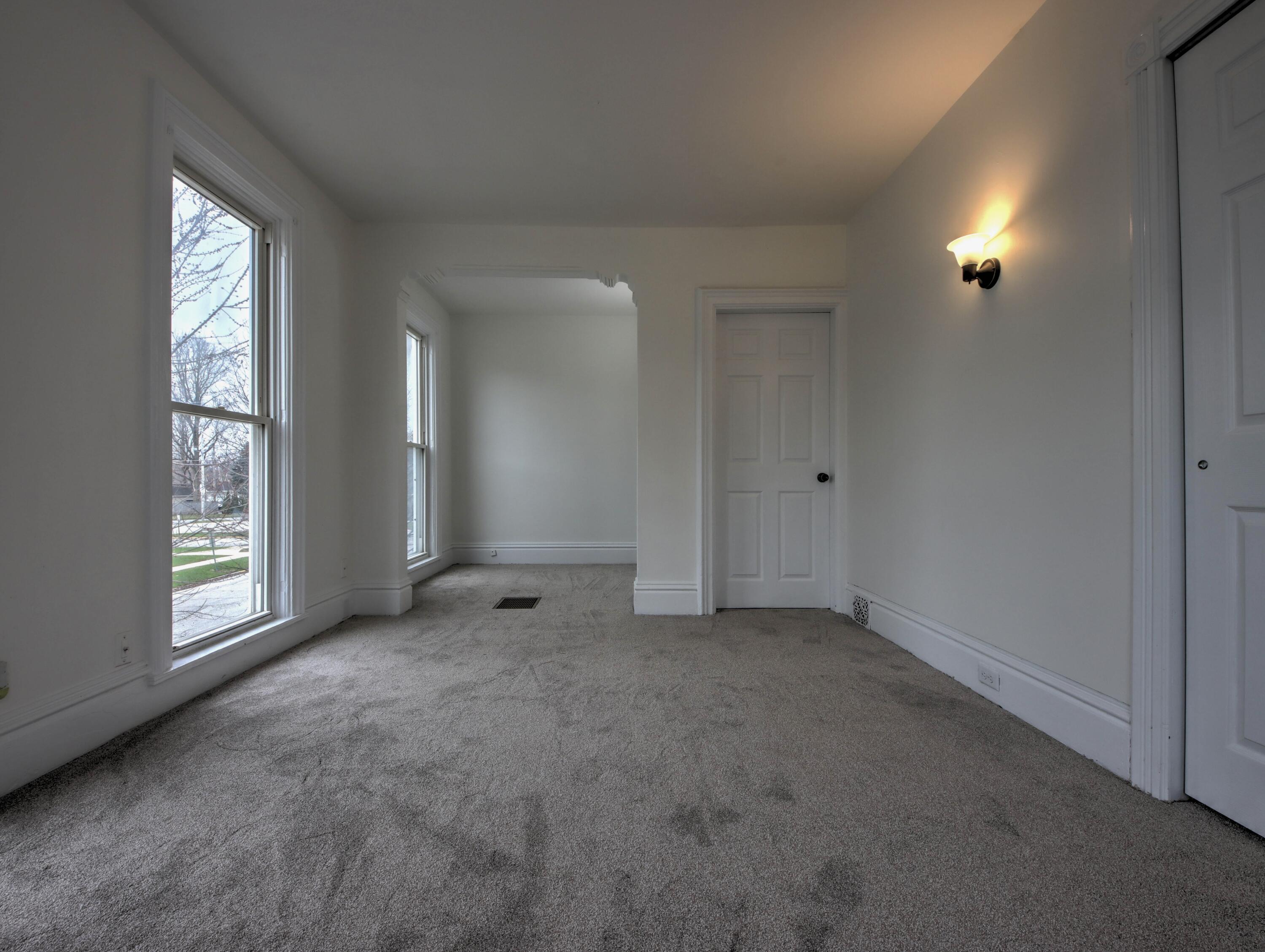 1005 Harrison Street La Porte, IN 46350 - Photo 26 of 54 an empty room with windows and closet
