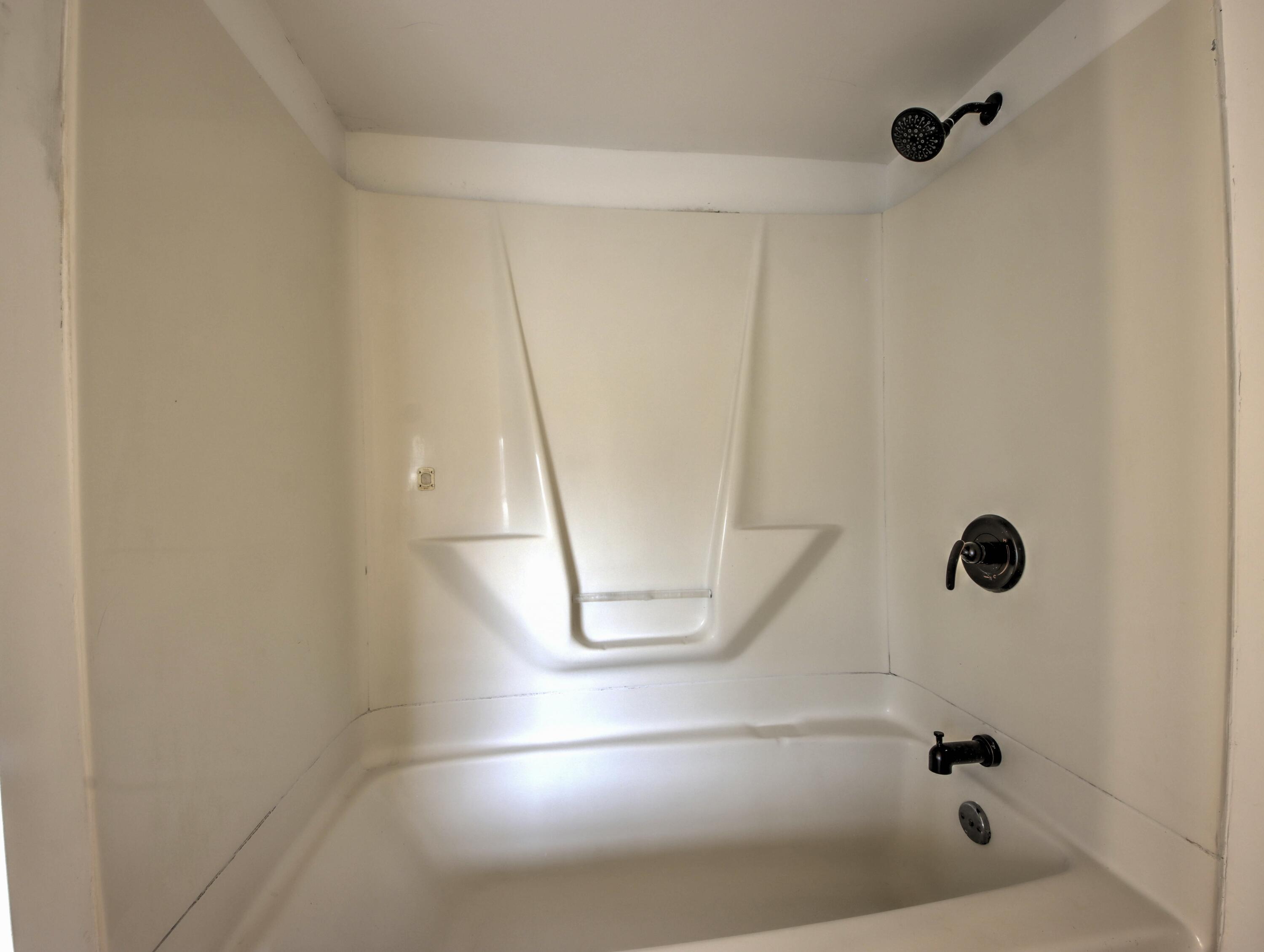 1005 Harrison Street La Porte, IN 46350 - Photo 32 of 54 a bathroom with a glass shower door