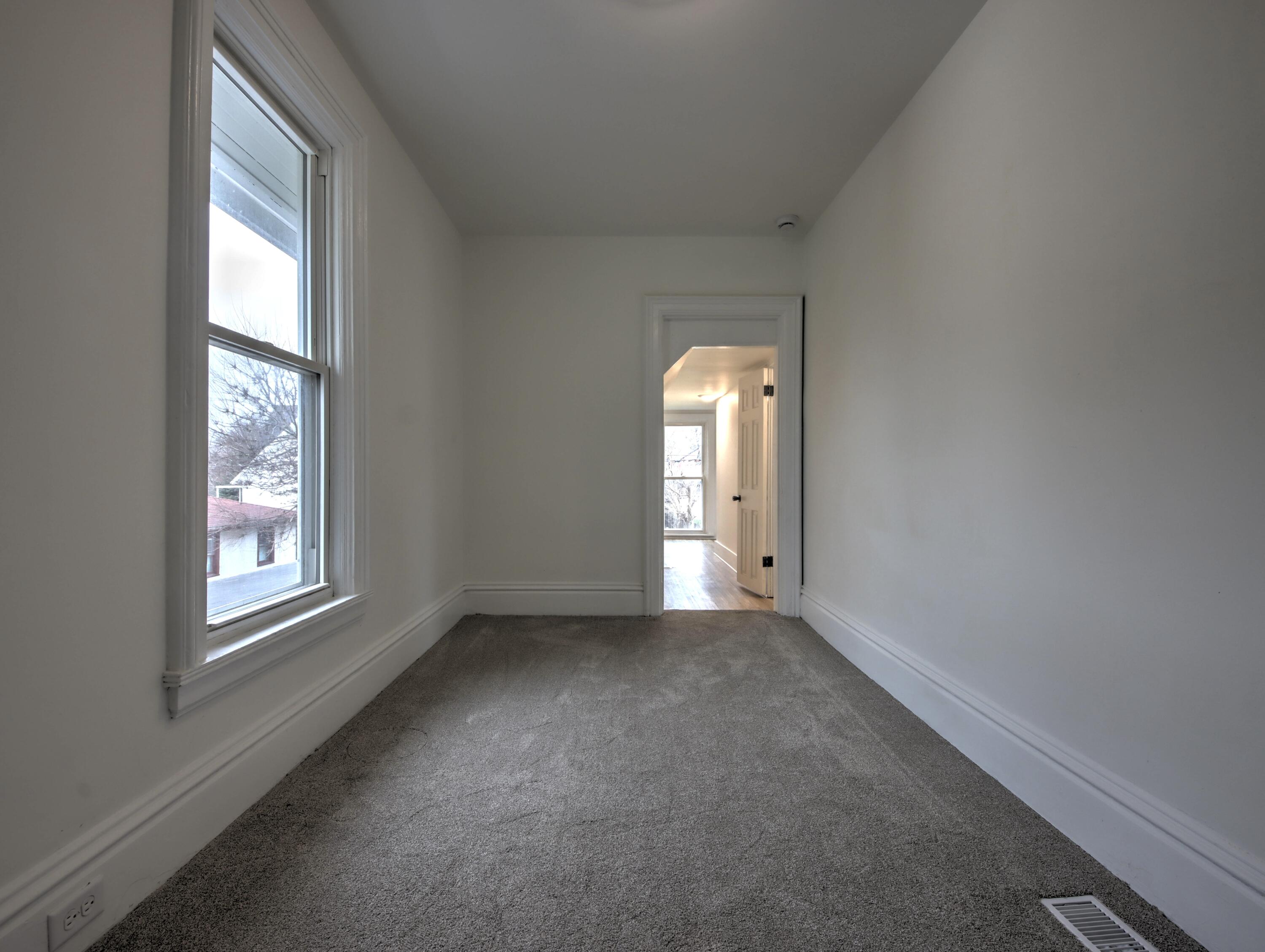 1005 Harrison Street La Porte, IN 46350 - Photo 37 of 54 an empty room with windows