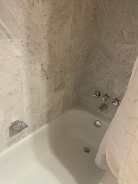 2000 Coco Plum Drive, Unit 1206 Marathon, FL 33050 - Photo 19 of 21 a bathroom with a bathtub