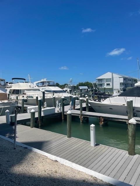 2000 Coco Plum Drive, Unit 1206 Marathon, FL 33050 - Photo 3 of 21 a view of a lake with outdoor space