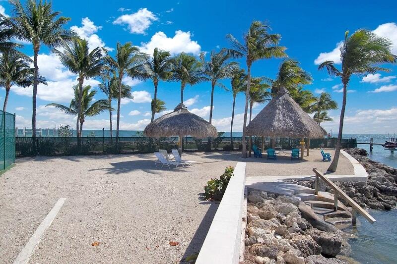 2000 Coco Plum Drive, Unit 1206 Marathon, FL 33050 - Photo 6 of 21 a view of a backyard