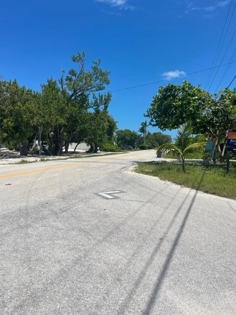 2000 Coco Plum Drive, Unit 1206 Marathon, FL 33050 - Photo 9 of 21 a view of a lake and a yard
