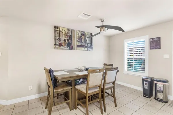 a view of a dining room with furniture