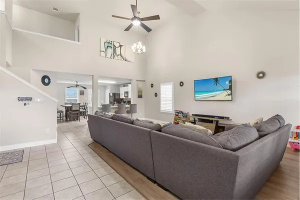 a living room with furniture and a window