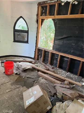 a kitchen with sink refrigerator and stove