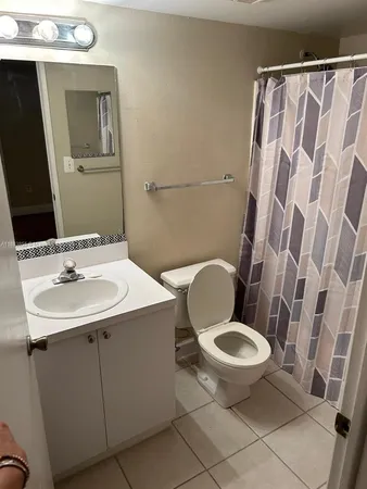 a view of storage and utility room with empty racks