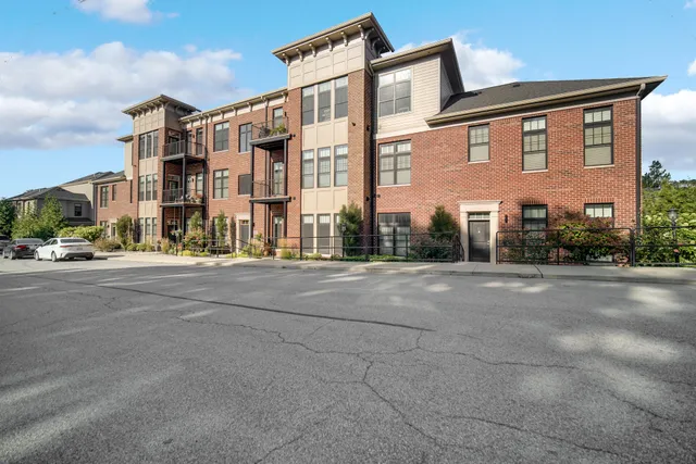 a view of a porch with chairs and backyard