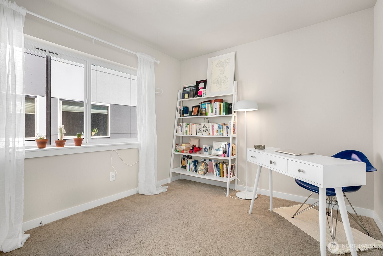 2736 South Andover Street Seattle, WA 98108 - Photo 17 of 24 a bedroom with a bed and a window