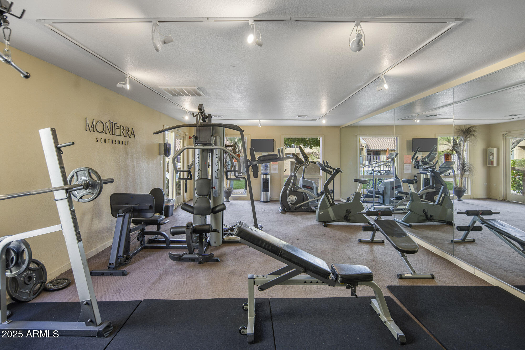 5877 North Granite Reef Road, Unit 2212 Scottsdale, AZ 85250 - Photo 15 of 16 a view of a room with gym equipment