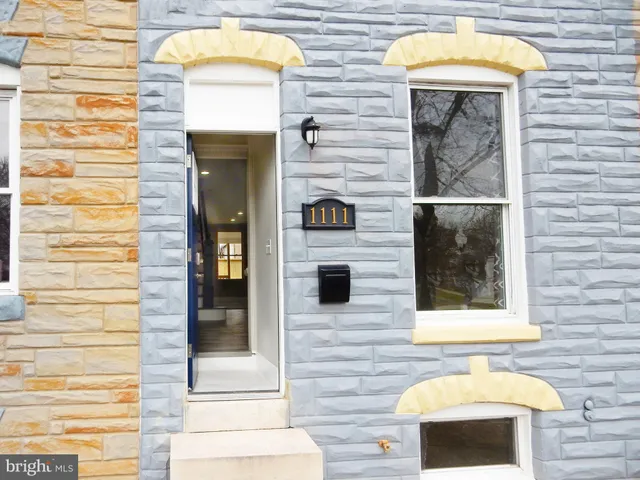 a view of front door of house with a door