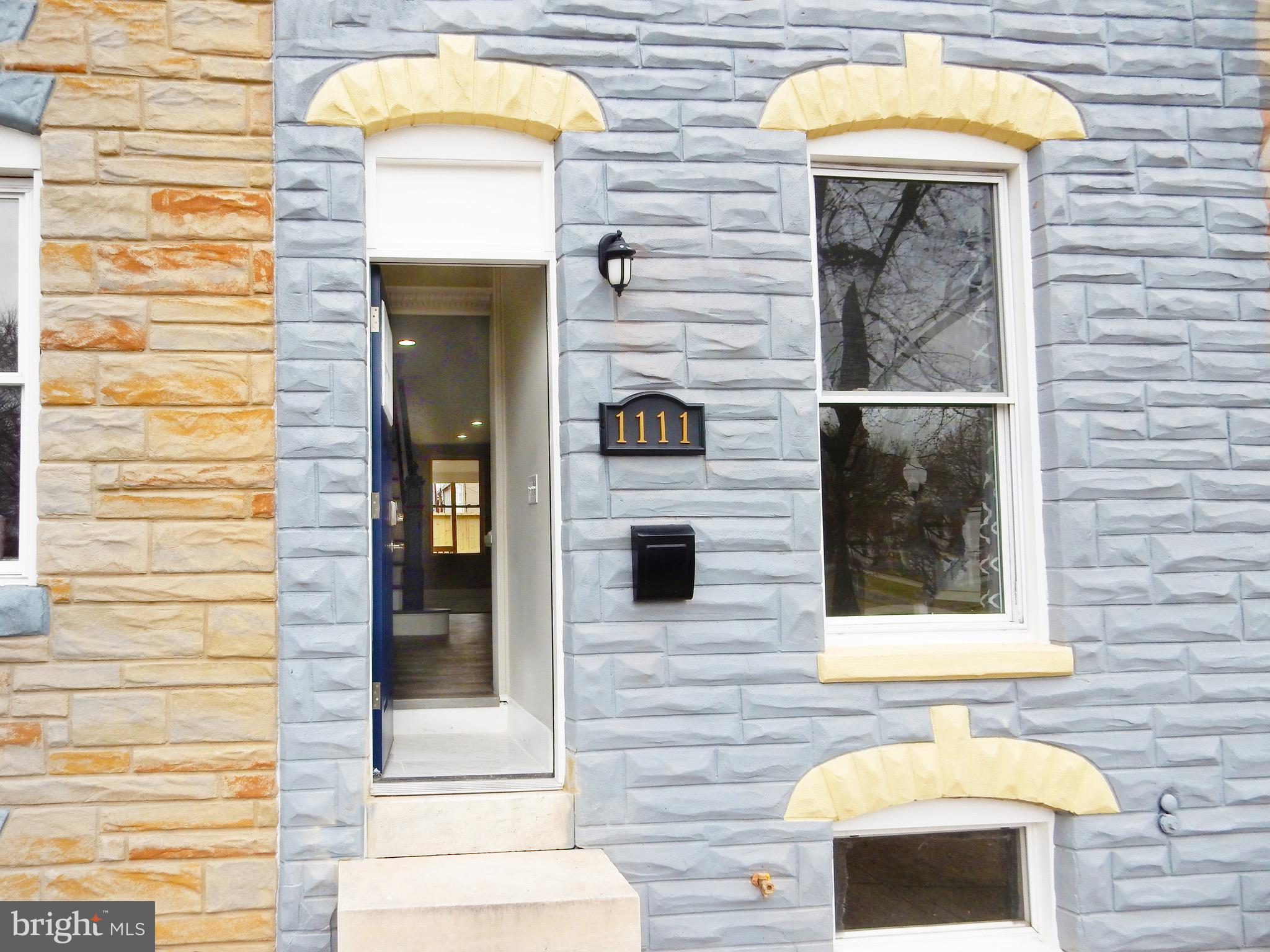 1111 Bayard Street Baltimore, MD 21223 - Photo 2 of 39 a view of front door of house with a door